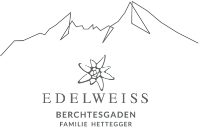 Logo des Hotels Edelweiss mit Bergsilhouette oben, einer Edelweiß-Blume in der Mitte, darunter der Name Edelweiss, gefolgt von Berchtesgaden und Familie Hettegger.