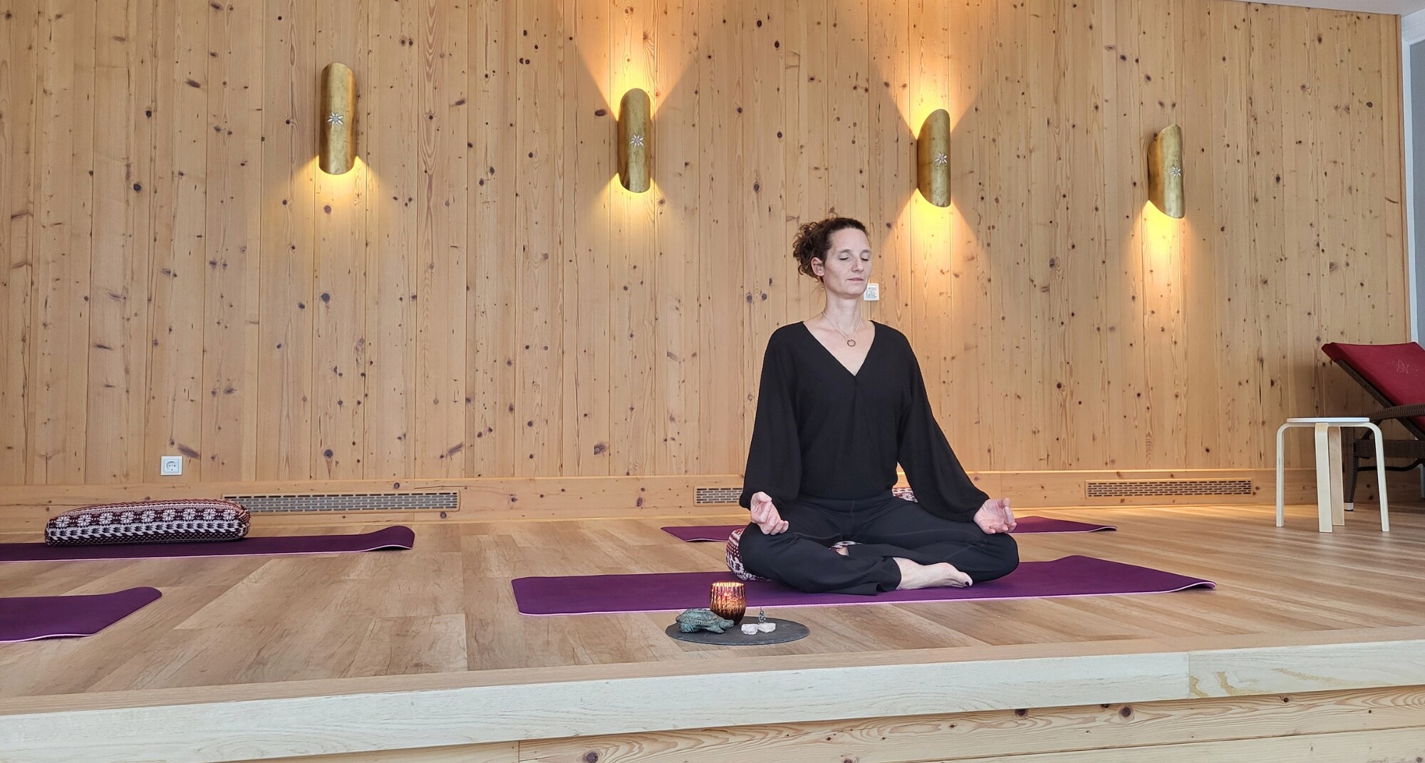 yoga instructor practising yoga and meditation during a wellness and active holiday at Hotel EDELWEISS Berchtesgaden in Bavaria